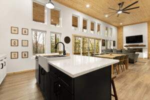 Custom-built modern living room in Red River Gorge cabin, showcasing quality construction and design features.